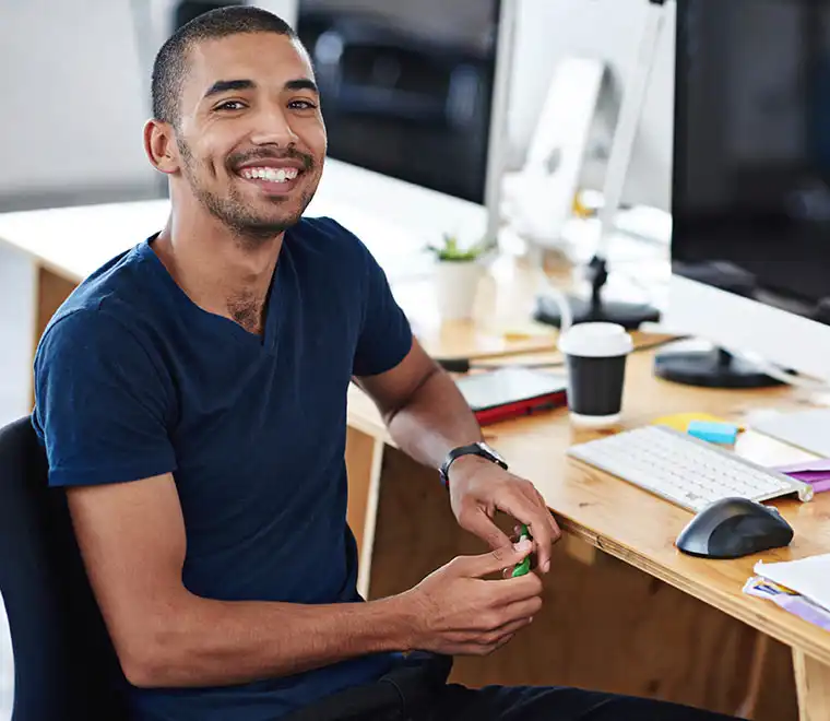 young-male-designer-at-desk