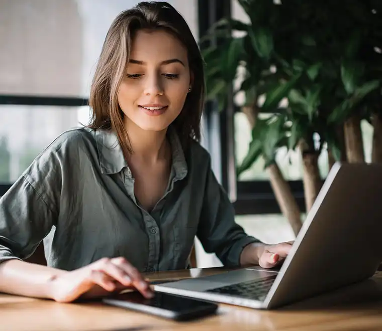 female-online-education-student-studies-on-laptop